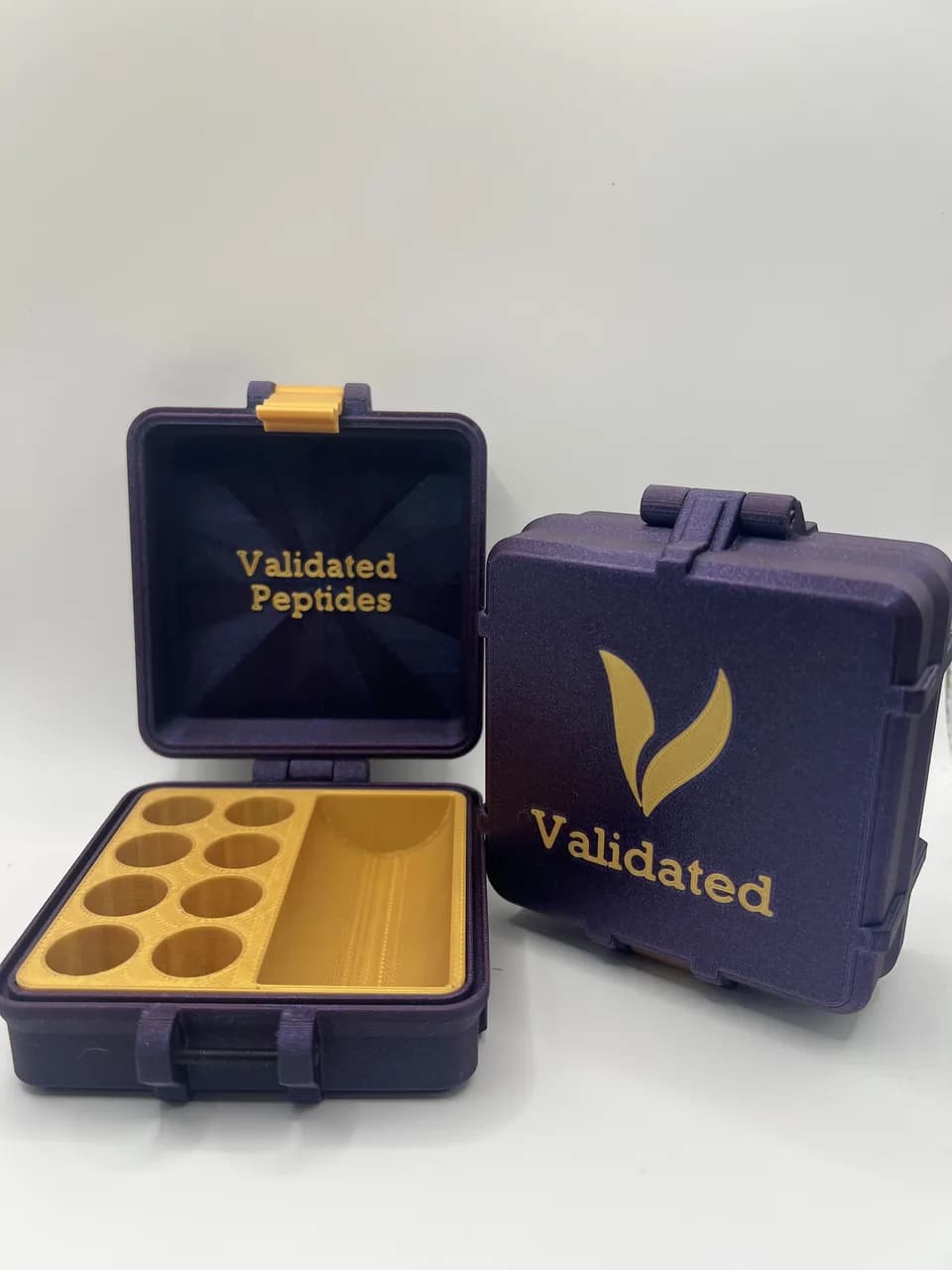Peptide vial storage box open showing eight vial slots and a large bay, beside a closed box