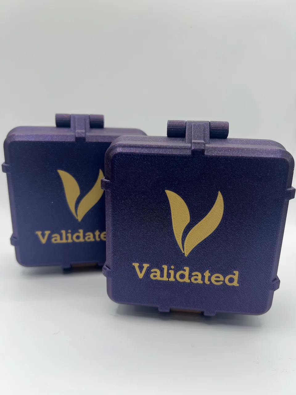 Two closed peptide vial storage boxes side by side